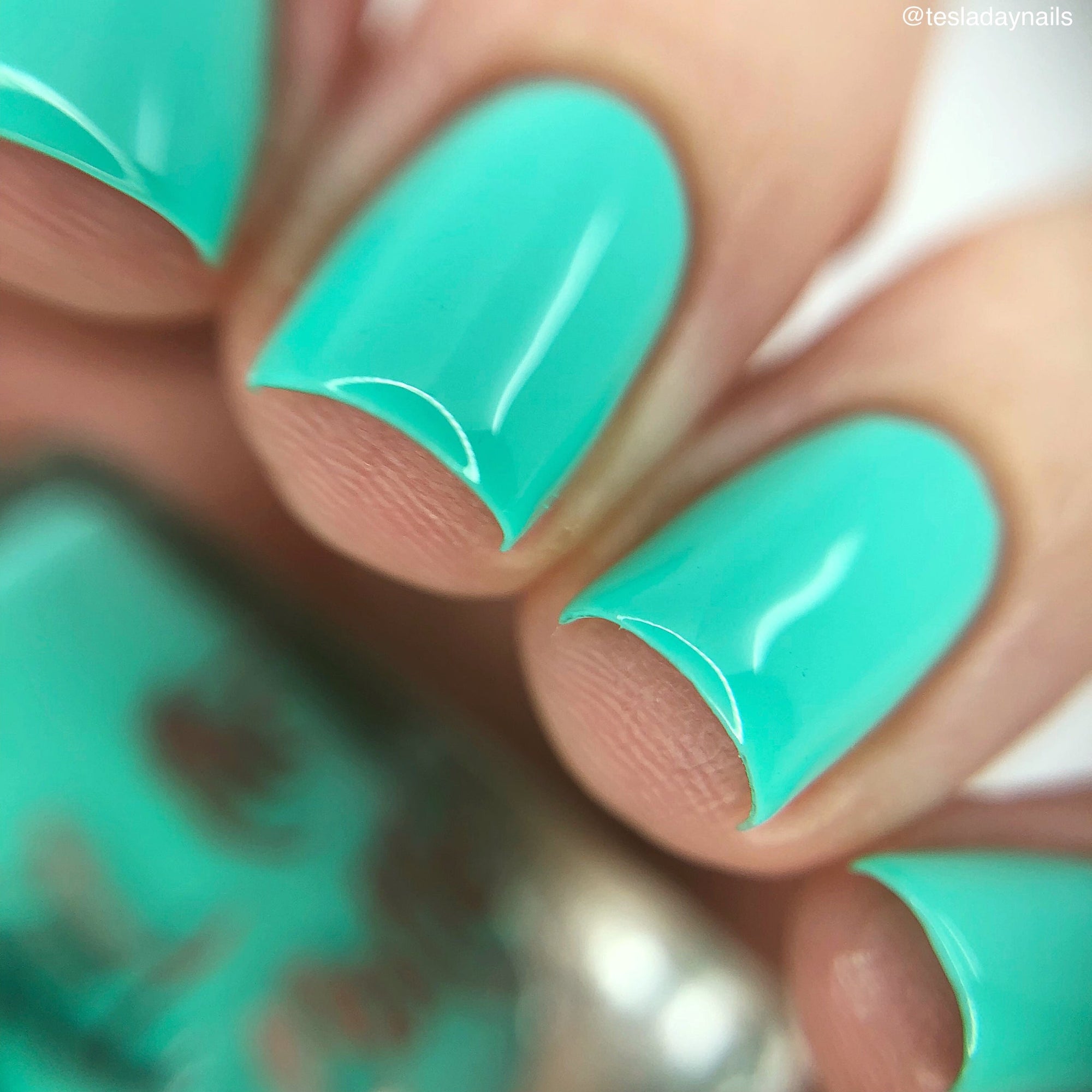 Tranquil Turquoise Tranquil turquoise water with subtle ripples reflecting  main image 4