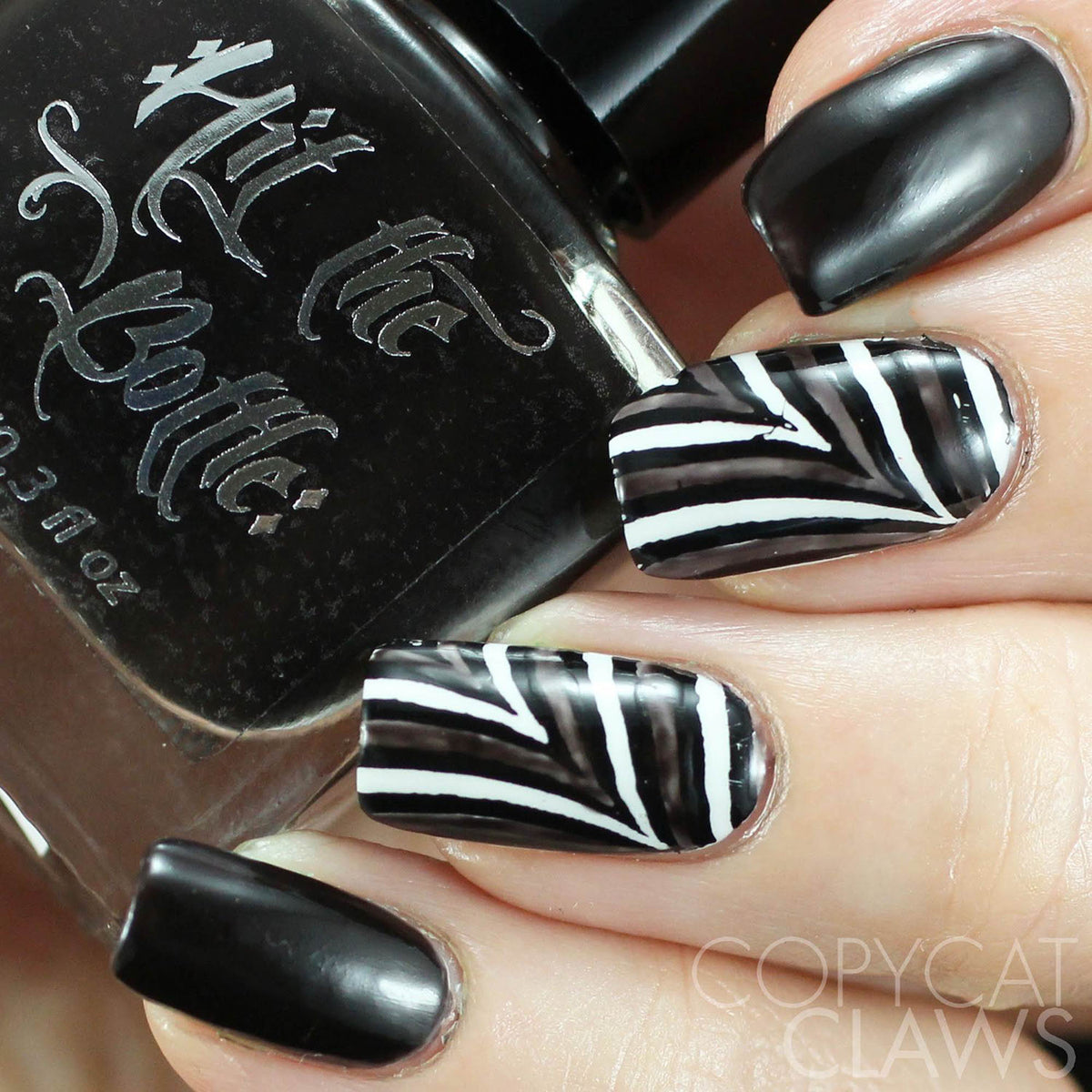 hit the bottle black nail polish nail art